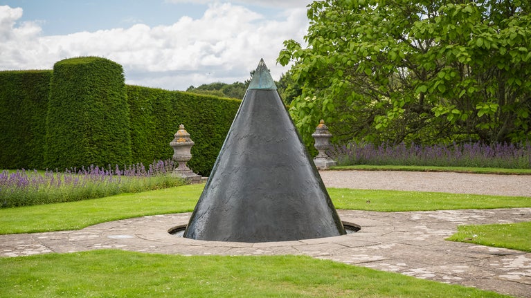 Conical water fountain in the garden at Antony House, Cornwall
